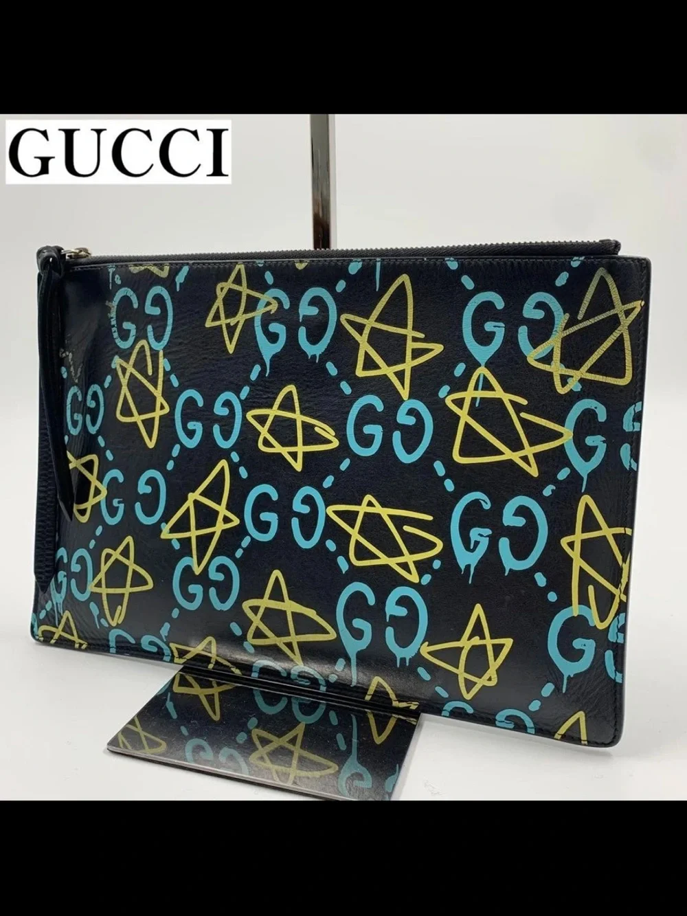 Gucci Black Leather Clutch with Blue GG and Yellow Star Print
